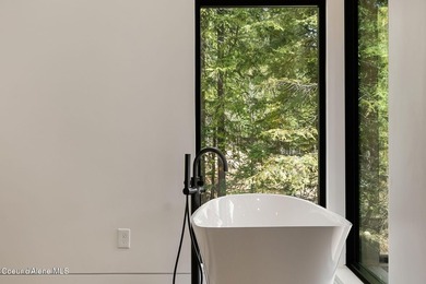 Stunning custom home with sweeping treetop and mountain views - photo 44