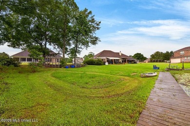 Stunning all-brick waterfront home on an expansive corner lot - photo 45