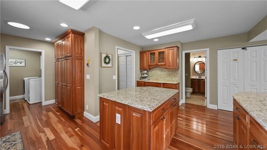 This fully furnished lakefront home is perfect for full-time - photo 13
