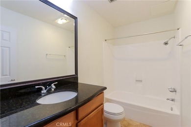 Nicely updated first-floor end-unit offering 3 bedrooms, 2 - photo 16