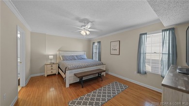 This fully furnished lakefront home is perfect for full-time - photo 22