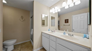 This fully furnished lakefront home is perfect for full-time - photo 23