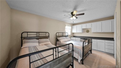 This fully furnished lakefront home is perfect for full-time - photo 25