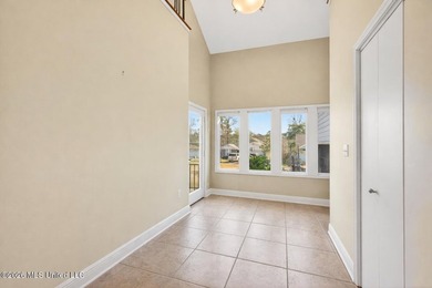 Located on a peaceful cul de sac in the coastal community of - photo 8