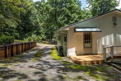 Tucked away in a quiet, serene slough on the highly coveted - photo 49