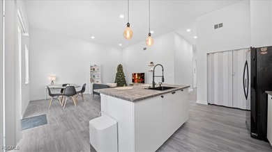 Say hello to this beautiful newly built home in Cape Coral, FL! - photo 14