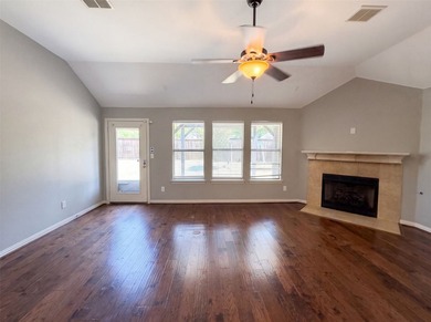 Welcome to 2601 Whispering Trl, a home that exudes warmth and - photo 3