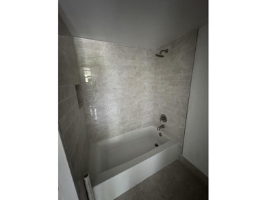 Welcome to your three-bedroom, two-bathroom waterfront - photo 9