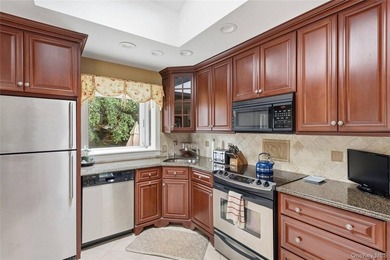 Welcome to this charming three-bedroom ranch, offering the - photo 3