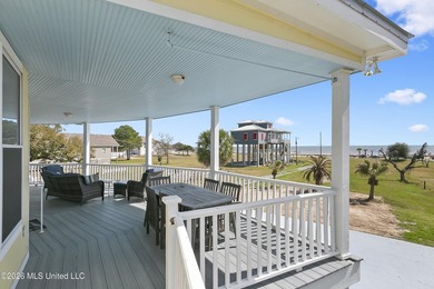 Gorgeous 3 bedroom, 3 bath beach front home beautifully built to - photo 6
