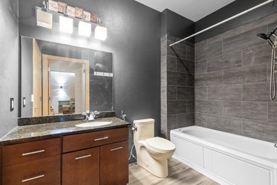 Urban living at its best. The open-concept layout is ideal for - photo 11