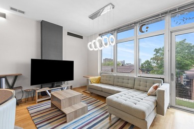 Urban living at its best. The open-concept layout is ideal for - photo 19