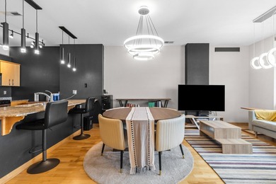 Urban living at its best. The open-concept layout is ideal for - photo 20