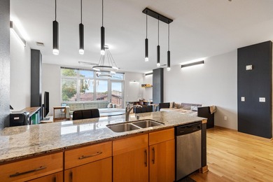 Urban living at its best. The open-concept layout is ideal for - photo 21