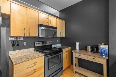 Urban living at its best. The open-concept layout is ideal for - photo 22