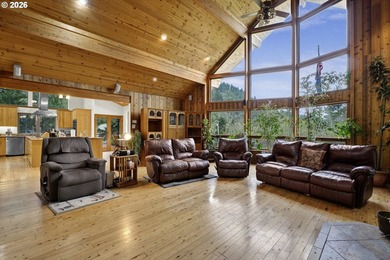 Stunning custom cedar home on 5 level acres offering the perfect - photo 4