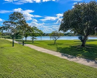 Welcome to this charming two-bedroom, two-bathroom condominium - photo 2