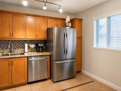 Welcome to this charming two-bedroom, two-bathroom condominium - photo 3