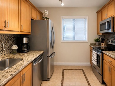 Welcome to this charming two-bedroom, two-bathroom condominium - photo 4