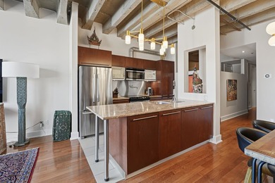 Bienvenue dans ce condo lumineux a aire ouverte, situe au coeur - photo 6