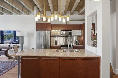 Bienvenue dans ce condo lumineux a aire ouverte, situe au coeur - photo 7