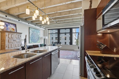 Bienvenue dans ce condo lumineux a aire ouverte, situe au coeur - photo 8