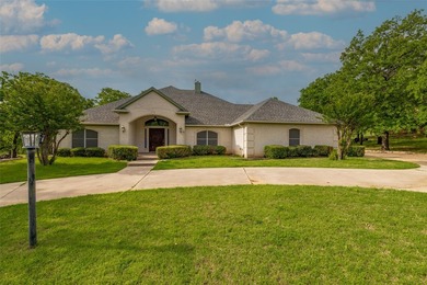Stunning custom brick home on an oversized lot in Runaway Bay - photo 1