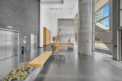 Experience elevated waterfront living at Marina Blue in the - photo 4