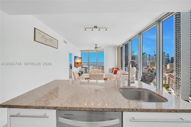 Experience elevated waterfront living at Marina Blue in the - photo 8