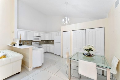 Spacious 3-bedroom, 2-bath villa featuring soaring vaulted - photo 4