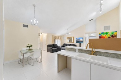 Spacious 3-bedroom, 2-bath villa featuring soaring vaulted - photo 5
