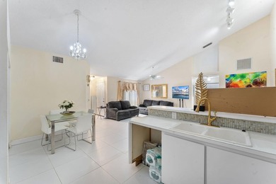 Spacious 3-bedroom, 2-bath villa featuring soaring vaulted - photo 6