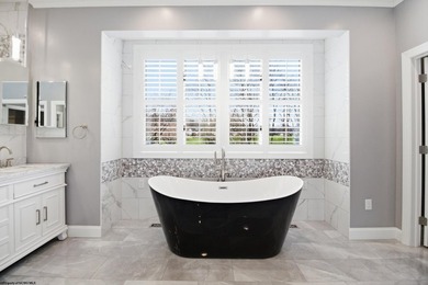 Experience golf course living at its finest in this exceptional - photo 16