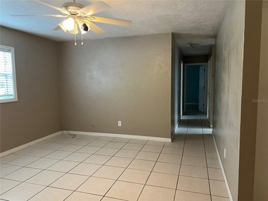 Welcome home to this charming 4-bedroom, 2-bath concrete block - photo 4