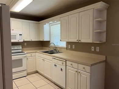 Welcome home to this charming 4-bedroom, 2-bath concrete block - photo 10