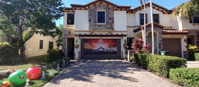 Lake Townhome/Townhouse For Sale in Coconut Creek, Florida