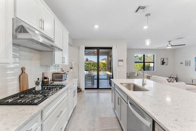 Introducing a stunning residence in the gated community of The - photo 3