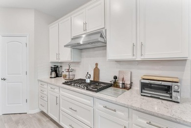 Introducing a stunning residence in the gated community of The - photo 4
