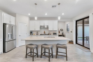 Introducing a stunning residence in the gated community of The - photo 9