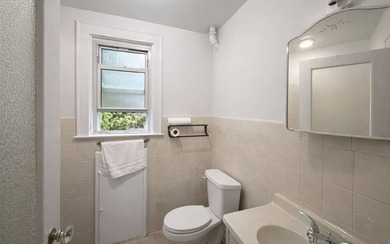 Rare opportunity to own a detached 1925-built residence on a - photo 13