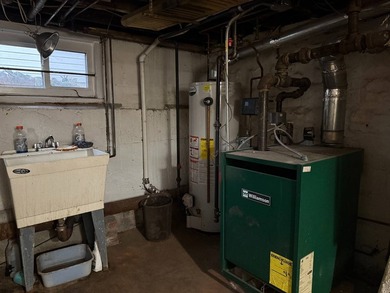Rare opportunity to own a detached 1925-built residence on a - photo 15