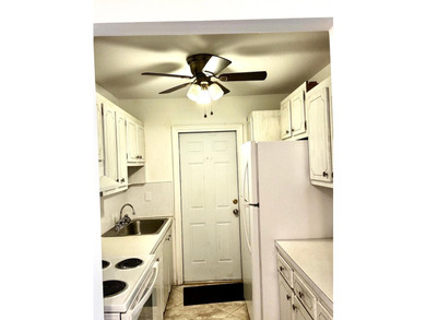 SPACIOUS, VACANT CORNER UNIT IN A DESIRABLE 55+ COMMUNITY. JUST - photo 11