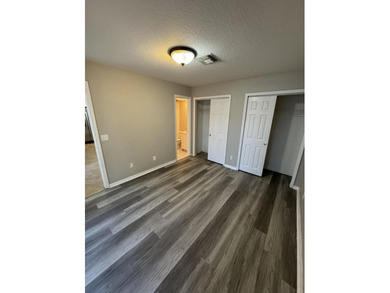 Welcome to this charming three-bedroom, three-bathroom townhouse - photo 12