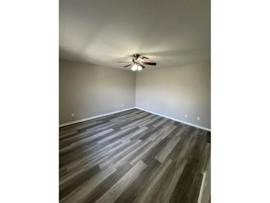 Welcome to this charming three-bedroom, three-bathroom townhouse - photo 19