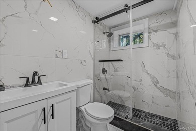 This fully renovated 2-family townhouse in the heart of Ocean - photo 5