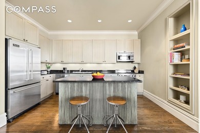 This duplex penthouse residence feels like a townhouse in the - photo 6