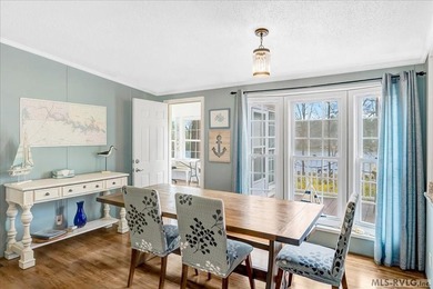 Effortless lakefront living meets income potential--welcome to