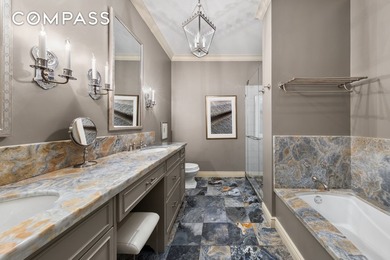 This duplex penthouse residence feels like a townhouse in the - photo 10