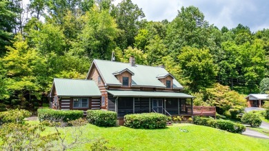 Step into timeless mountain living with this 3-bedroom, 3-bath