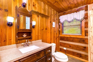 Step into timeless mountain living with this 3-bedroom, 3-bath